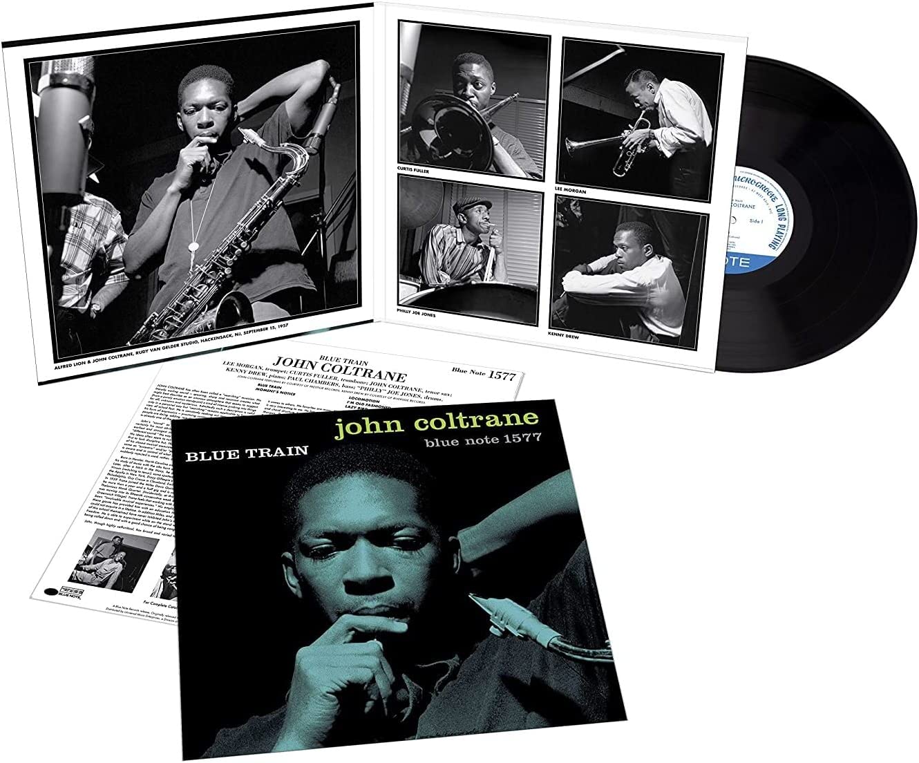 "Black vinyl record with cover featuring a man in contemplative pose, partially visible behind."