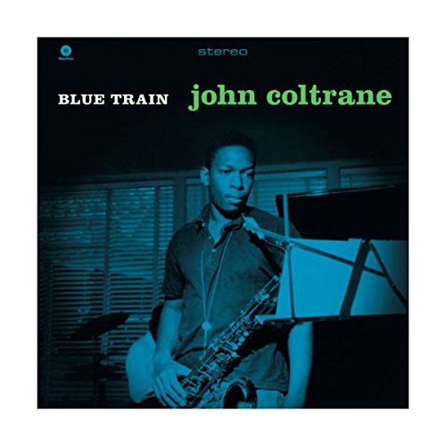 John Coltrane’s “Blue Train” vinyl album cover with a portrait of the artist.