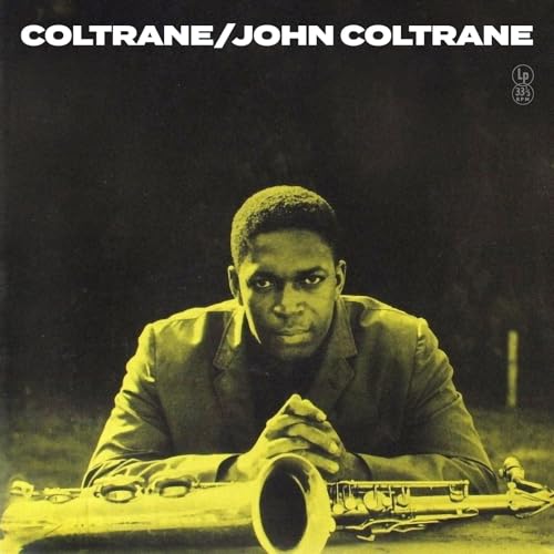 John Coltrane album cover with a portrait and saxophone, yellow vinyl edition.