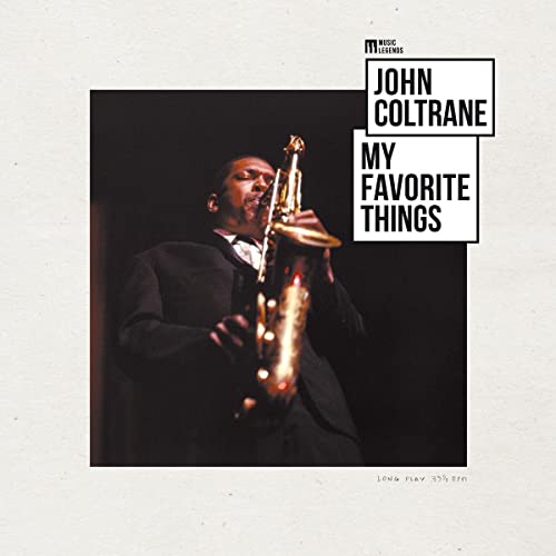 John Coltrane playing a saxophone, album cover with text overlay.
