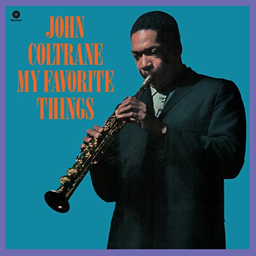 John Coltrane playing saxophone on a blue background with orange text.