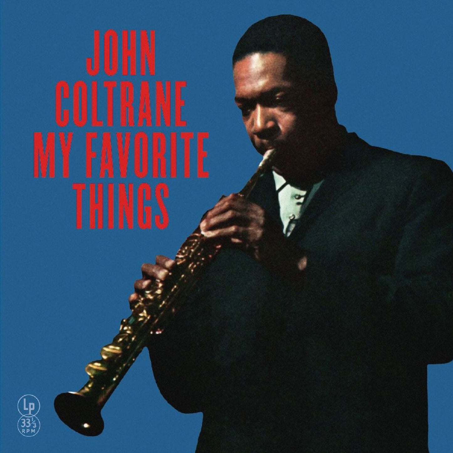 John Coltrane album cover, portrait of musician with saxophone, blue background.