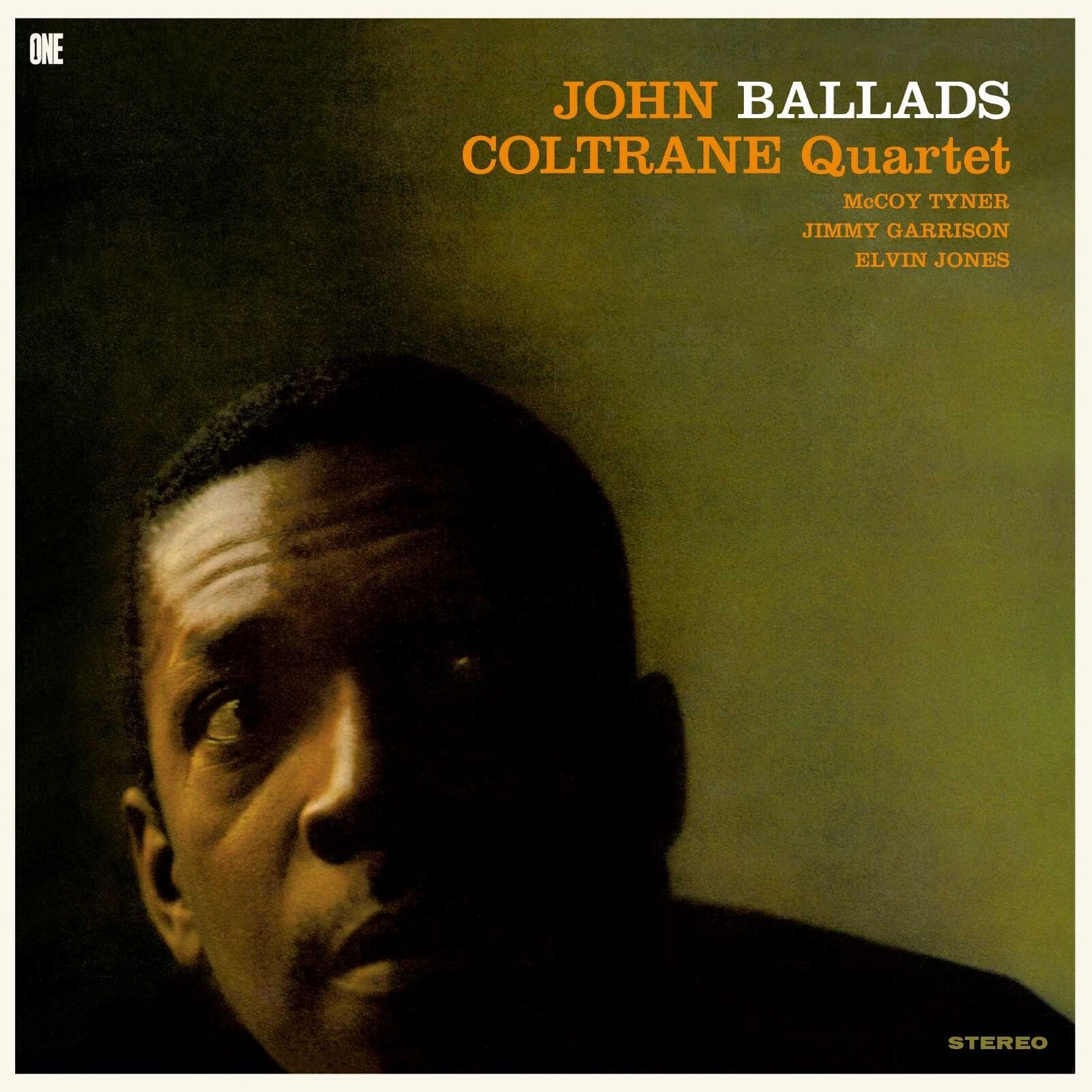 Album cover featuring a close-up portrait of John Coltrane against a dark olive background.