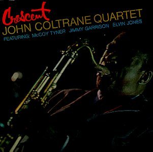 John Coltrane Quartet’s “Crescent” vinyl album cover featuring a saxophone player.