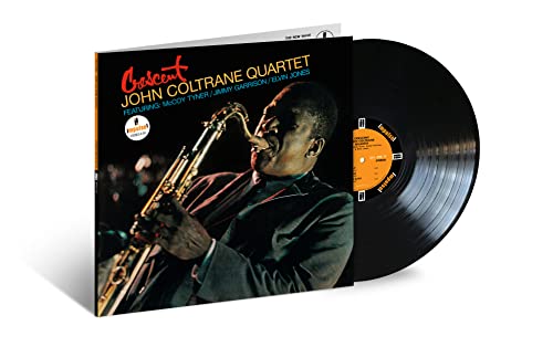 John Coltrane Quartet's "Crescent" vinyl record with saxophone player portrait.