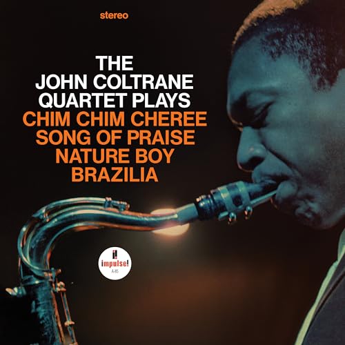 John Coltrane playing saxophone on the cover of a vinyl record.