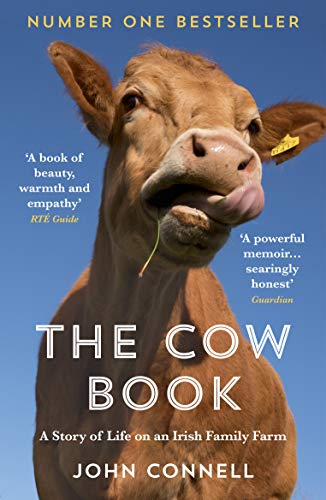 Book cover featuring a brown cow licking its nose against a clear blue sky.