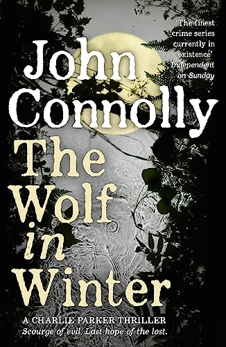 Book cover for The Wolf in Winter by John Connolly featuring a moonlit forest.