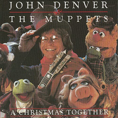 John Denver with The Muppets on album cover, playing guitar.