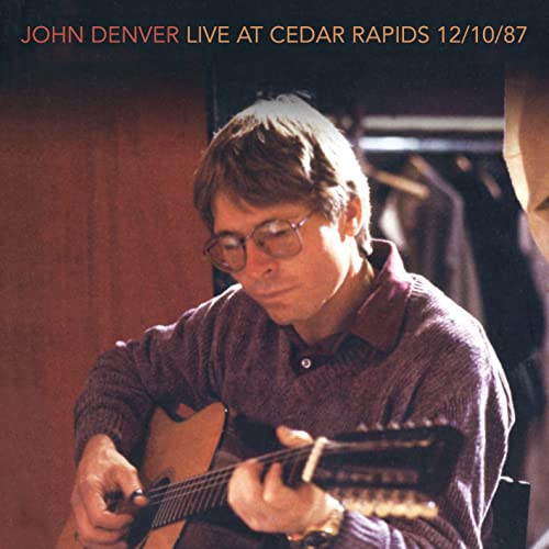 John Denver with guitar, album cover for "Live At Cedar Rapids.