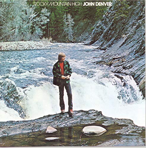 John Denver album cover featuring a man by a waterfall and river.