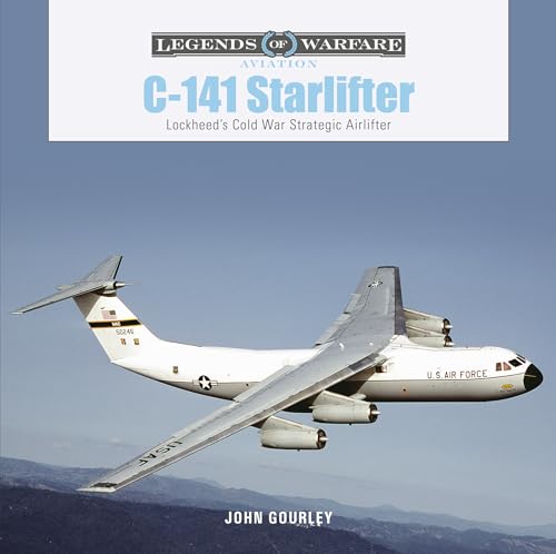C-141 Starlifter aircraft in flight against a mountainous backdrop.