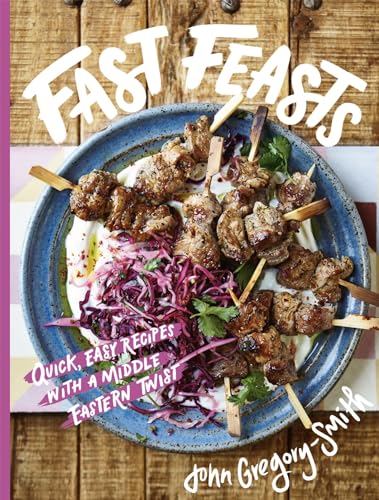 Cookbook cover featuring grilled meat skewers on a blue plate.