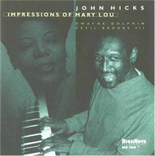 "CD cover with a green-toned image of two men, one playing piano."