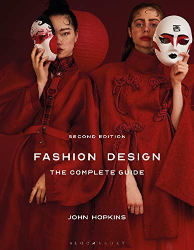 Book cover: “Fashion Design” with two models wearing red robes and masks.