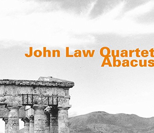 "Album cover with black and white image and orange text."