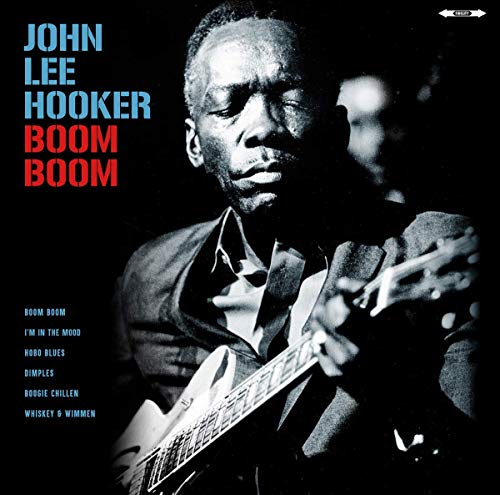 John Lee Hooker's "Boom Boom" vinyl record cover featuring his portrait.