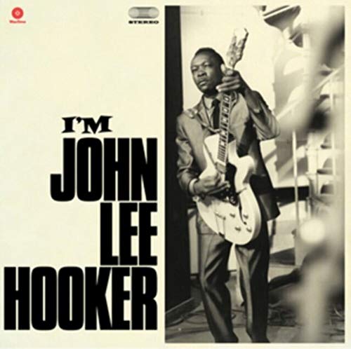 John Lee Hooker album cover: portrait of musician with guitar.