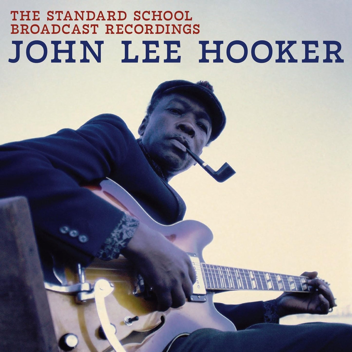 John Lee Hooker portrait with guitar, album cover for "The Standard School Broadcast Recordings".