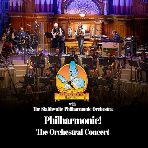 Orchestra performing on stage with musicians and a butterfly logo.