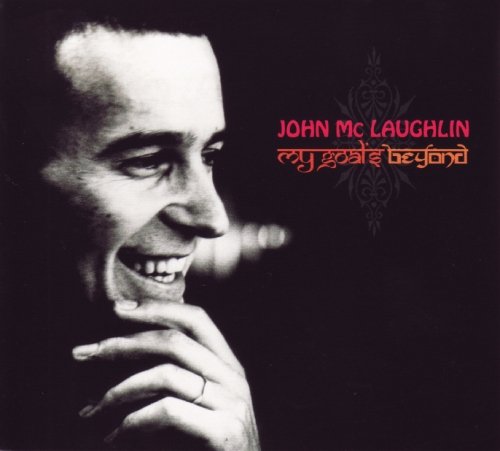 John McLaughlin album cover, close-up portrait of a smiling man.
