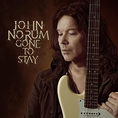John Norum album cover featuring a man with a guitar.