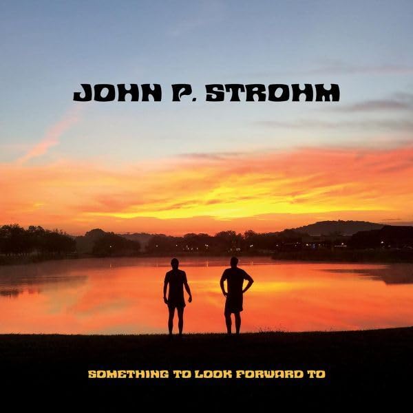 CD cover: Two silhouetted figures watch a vibrant sunset over water.