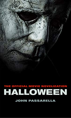 Book cover featuring a close-up of Michael Myers' mask with title "Halloween" and author's name.