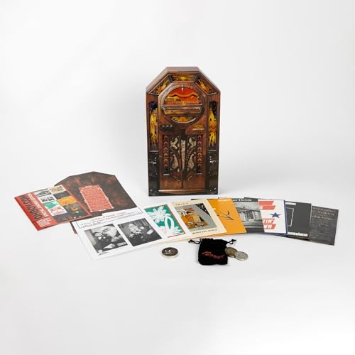 Miniature jukebox box set with accompanying vinyl singles and memorabilia.