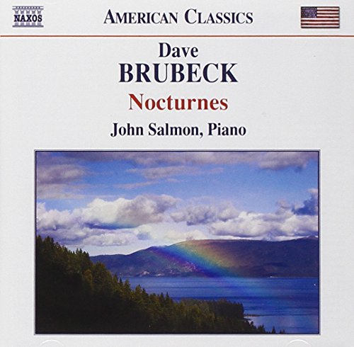 CD cover featuring a landscape with a rainbow over a lake and mountains.