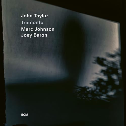 CD cover for John Taylor Trio’s “Tramonto” with a blurred landscape.