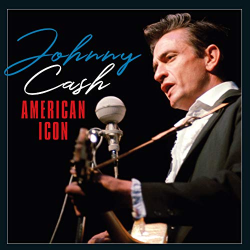 Johnny Cash singing into a microphone while playing guitar on a black background.