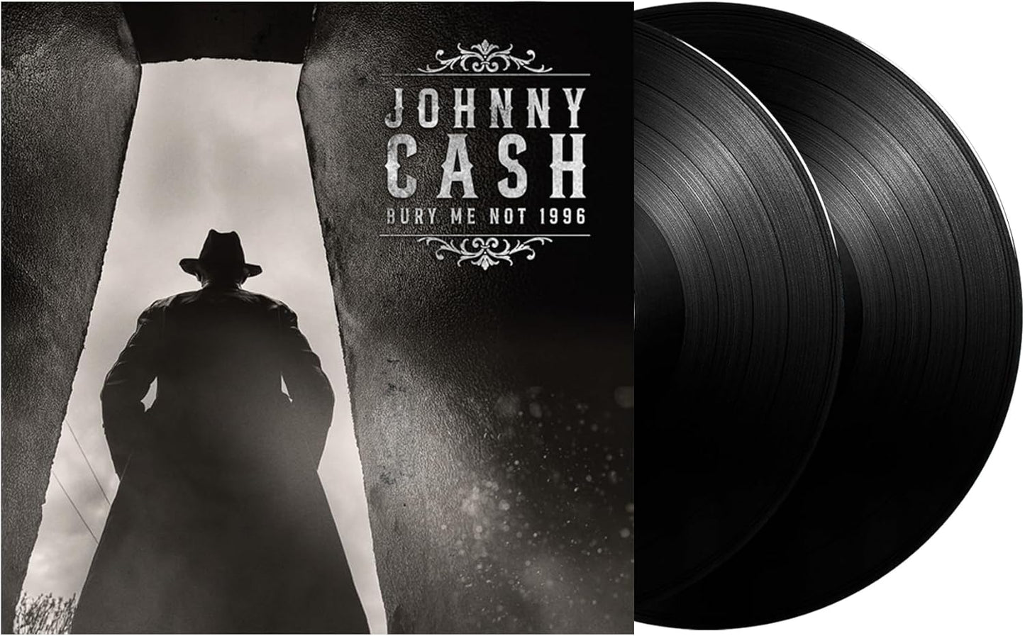 Johnny Cash “Bury Me Not” 1996 vinyl record cover and two black records.