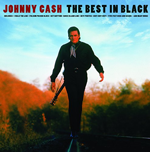 Johnny Cash album cover: man in black with guitar on railroad tracks.