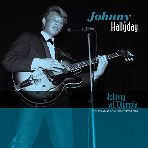 "Vinyl record cover featuring Johnny Hallyday playing guitar and singing into a microphone."
