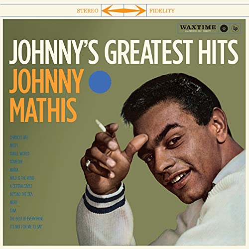 Johnny Mathis album cover, green background, portrait of the singer.