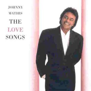 Johnny Mathis album cover, portrait of a smiling man in a suit.