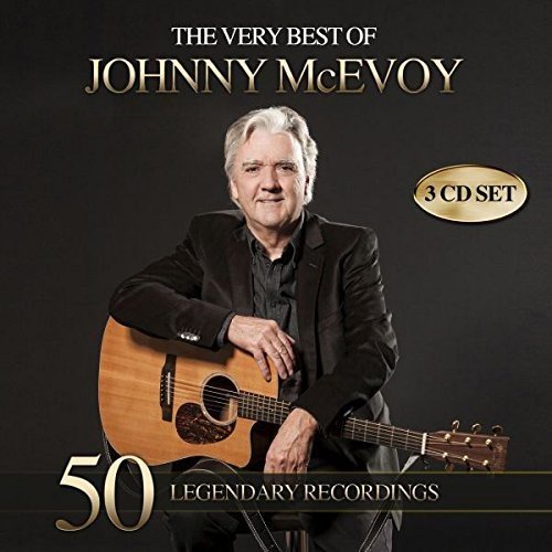 Johnny McEvoy portrait with guitar, album cover for a 3 CD set.