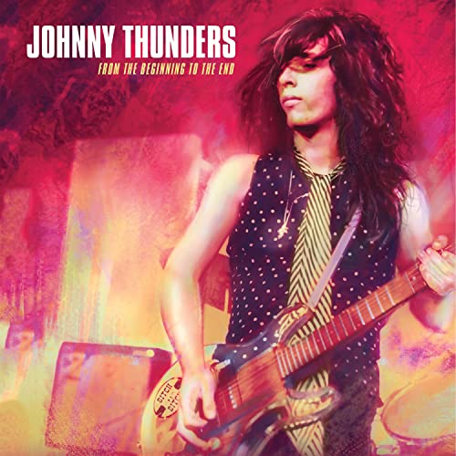 Johnny Thunders album cover featuring a musician with a guitar.