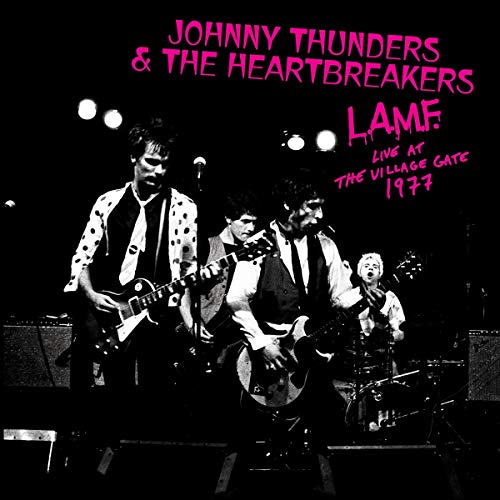 "Black and white vinyl album cover featuring Johnny Thunders and the Heartbreakers performing live."
