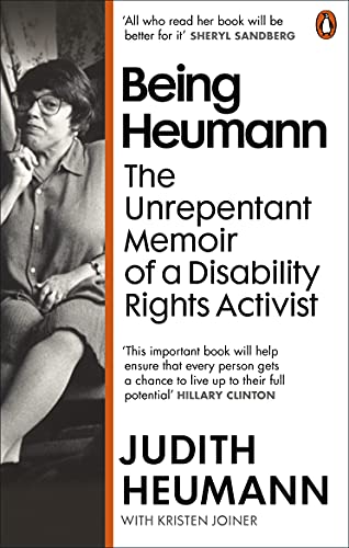 Book cover: Judith Heumann’s memoir, “Being Heumann,” with a portrait of the author.