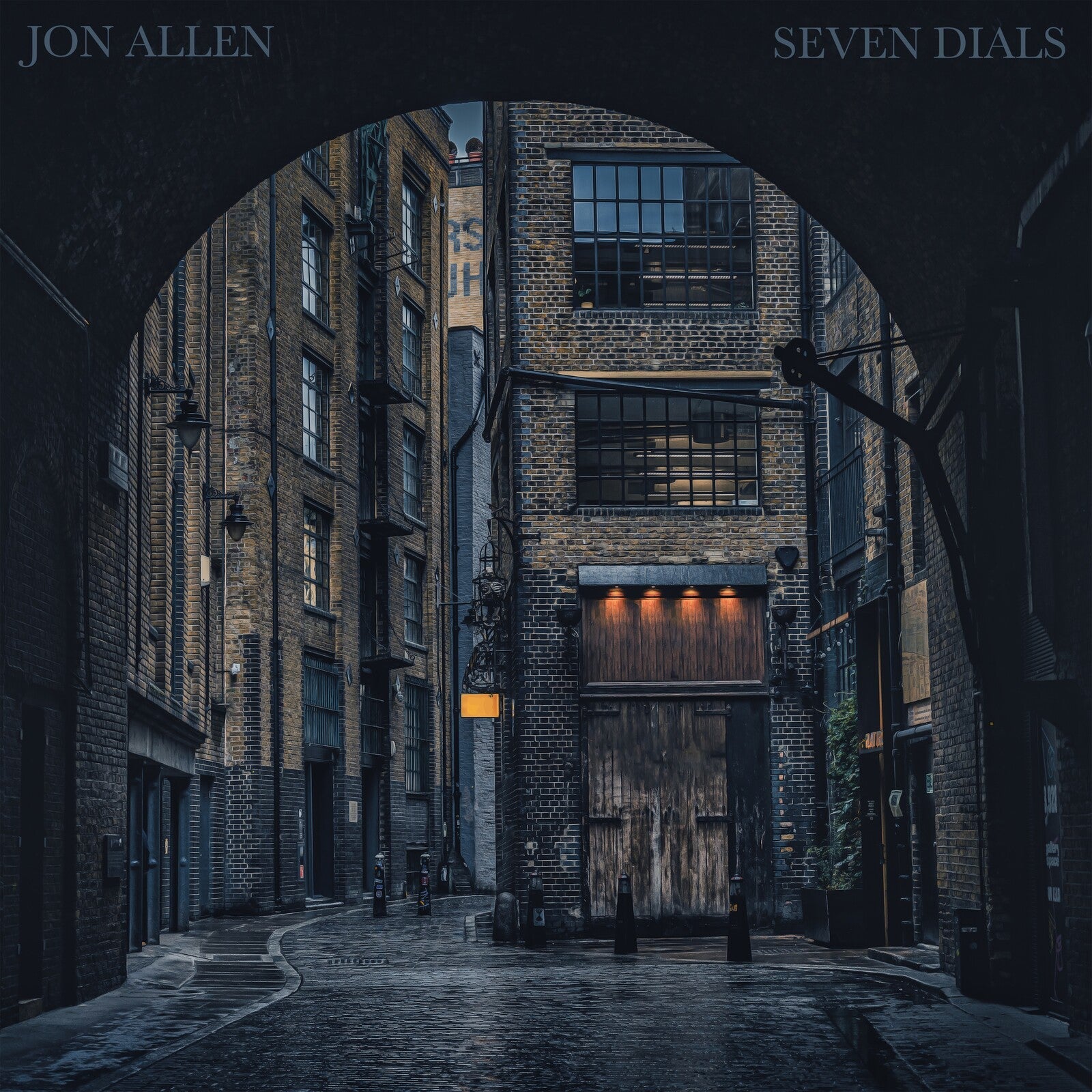 CD cover for Jon Allen’s “Seven Dials” showing a brick alleyway.