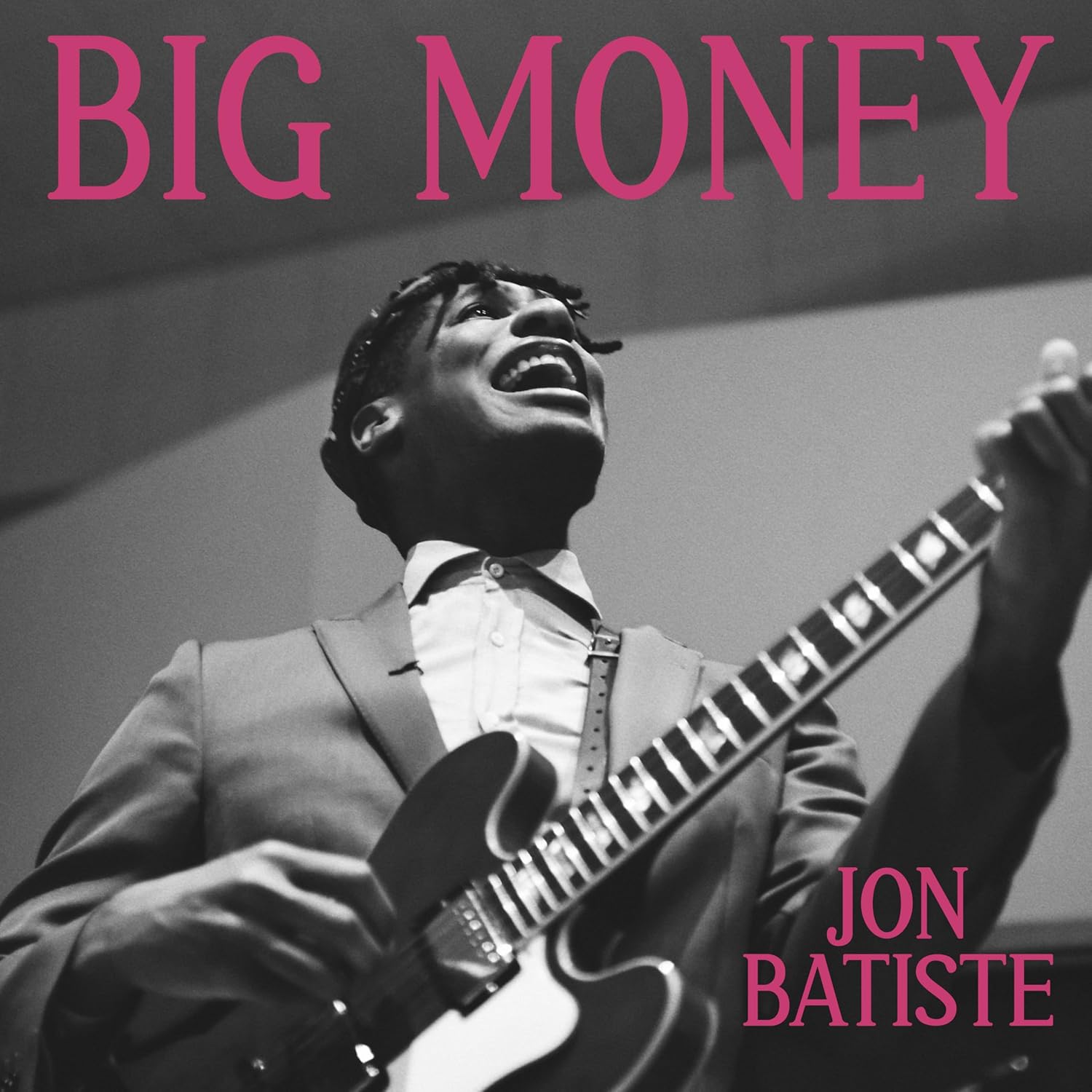 Jon Batiste playing guitar, album cover for “BIG MONEY.”