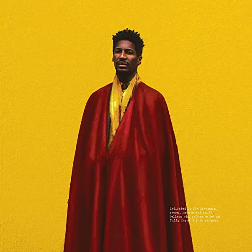Jon Batiste album cover: man in red cloak on yellow background.