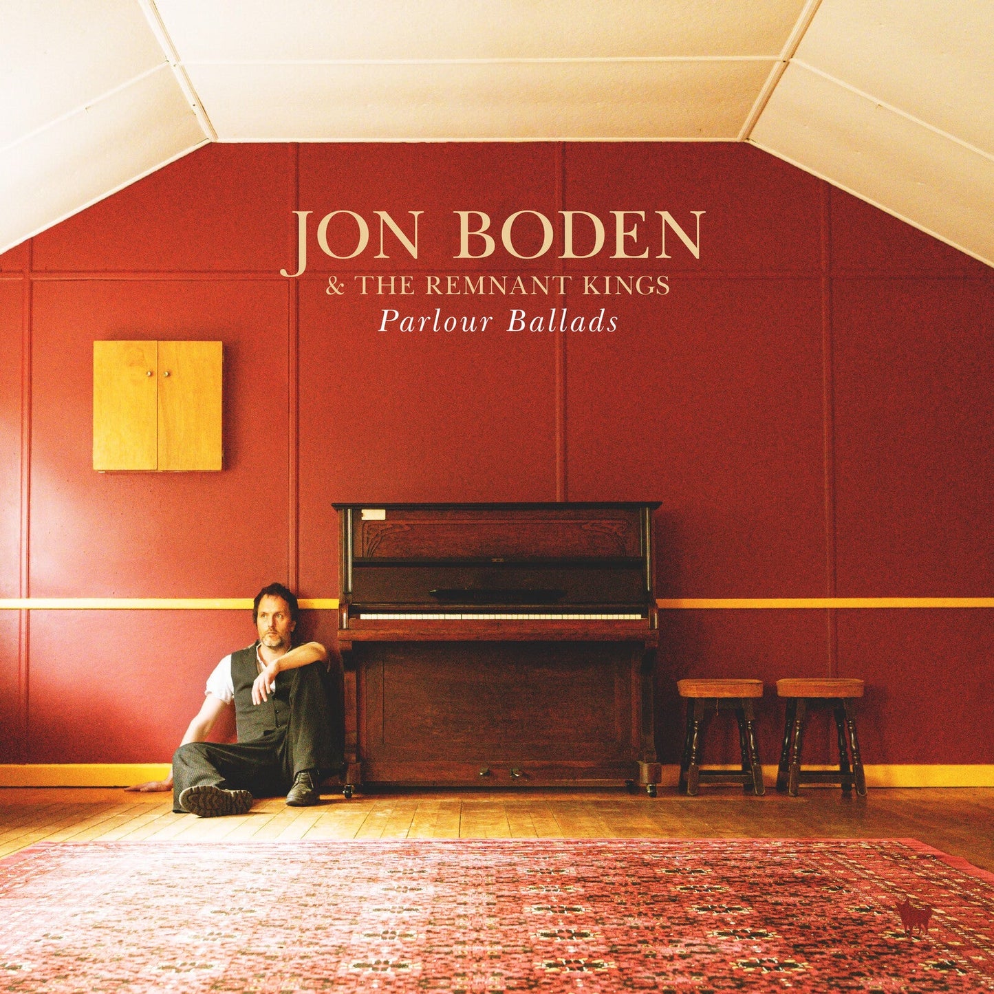 Album cover: Jon Boden & The Remnant Kings, man seated by piano.
