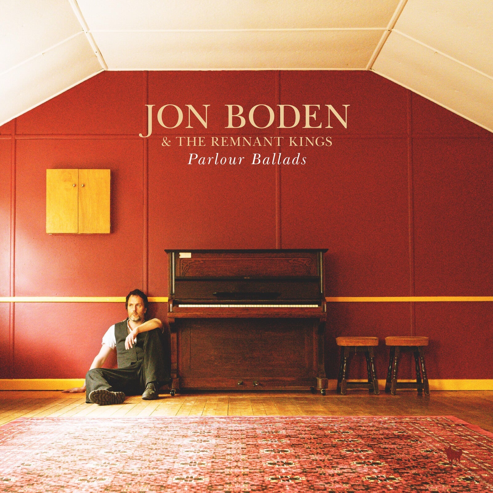 Album cover: Jon Boden & The Remnant Kings, man seated by piano.