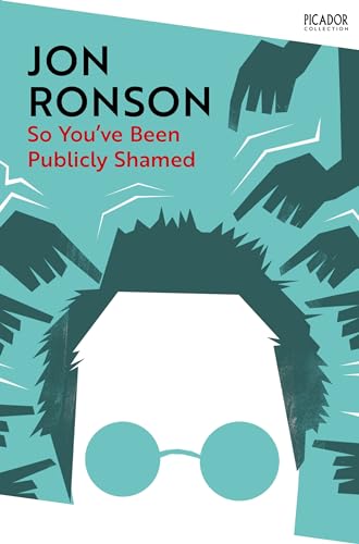 Book cover: teal background, silhouetted face with glasses, pointing hands.