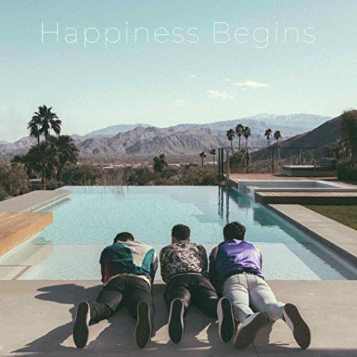 Jonas Brothers album cover: three men by a pool with mountains.
