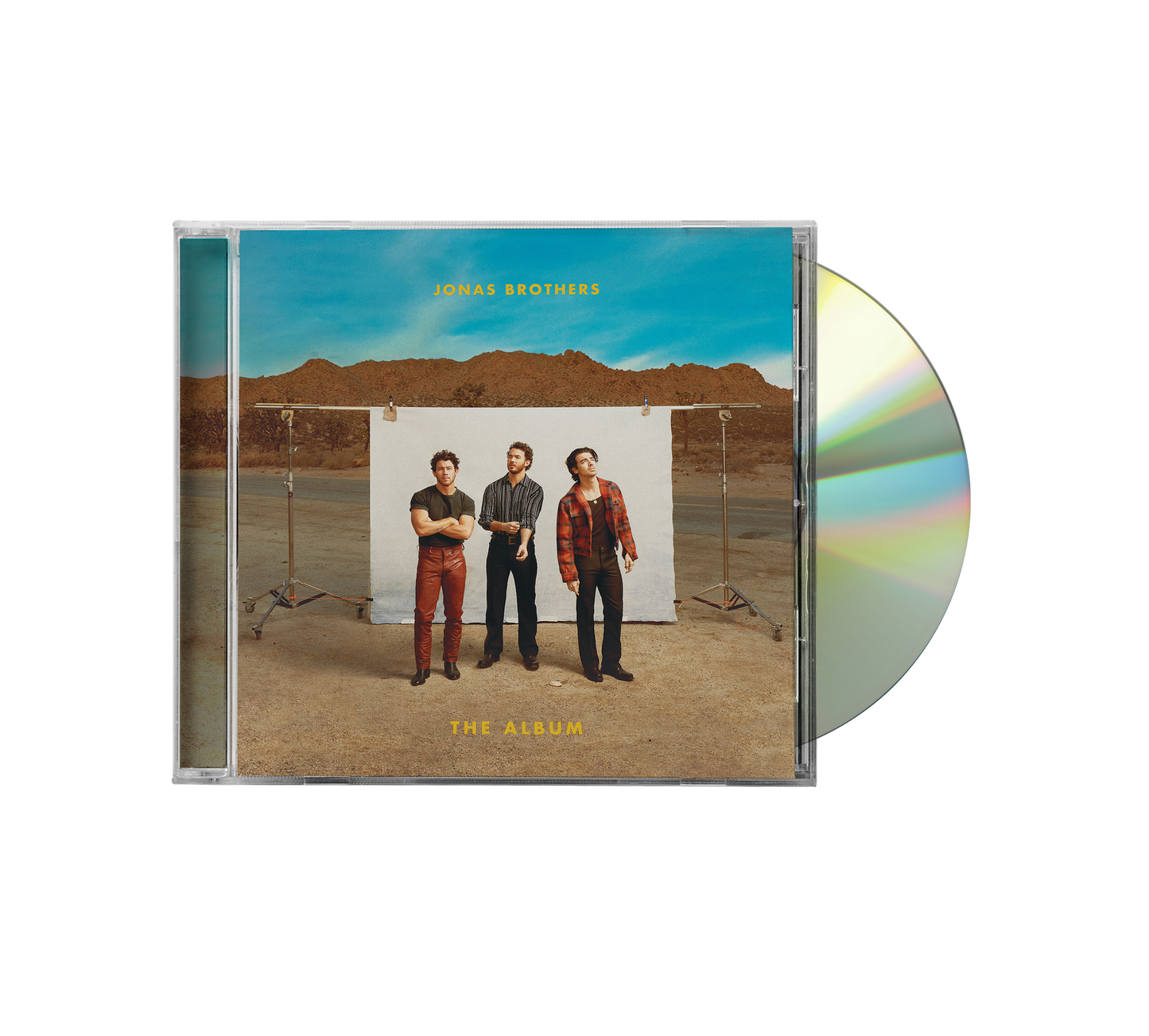 "CD case with disc partially out, featuring Jonas Brothers standing in a desert."