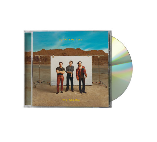 "CD case with disc partially out, featuring Jonas Brothers standing in a desert."